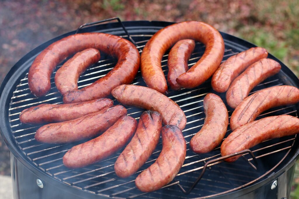 Smoking Sausage on top of the Weber smoker