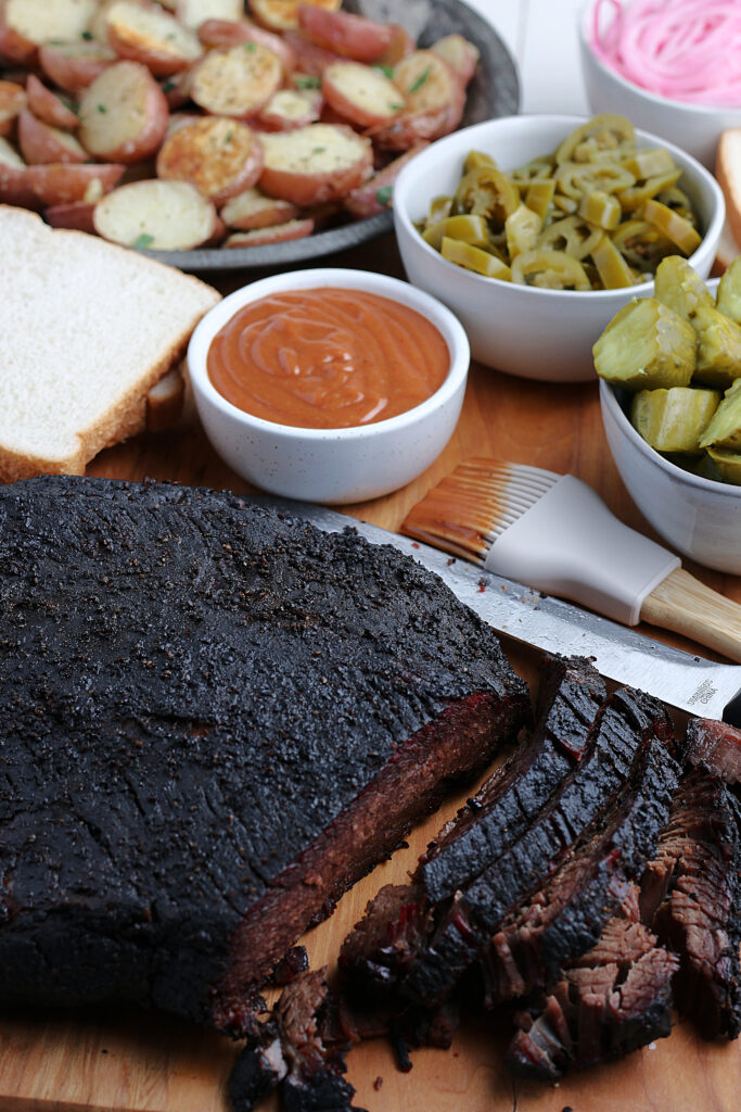 smoked brisket served with pickles and jalepenos