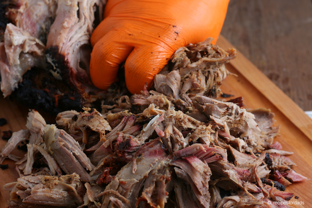 Shredding Pork Butt after it has been cooked