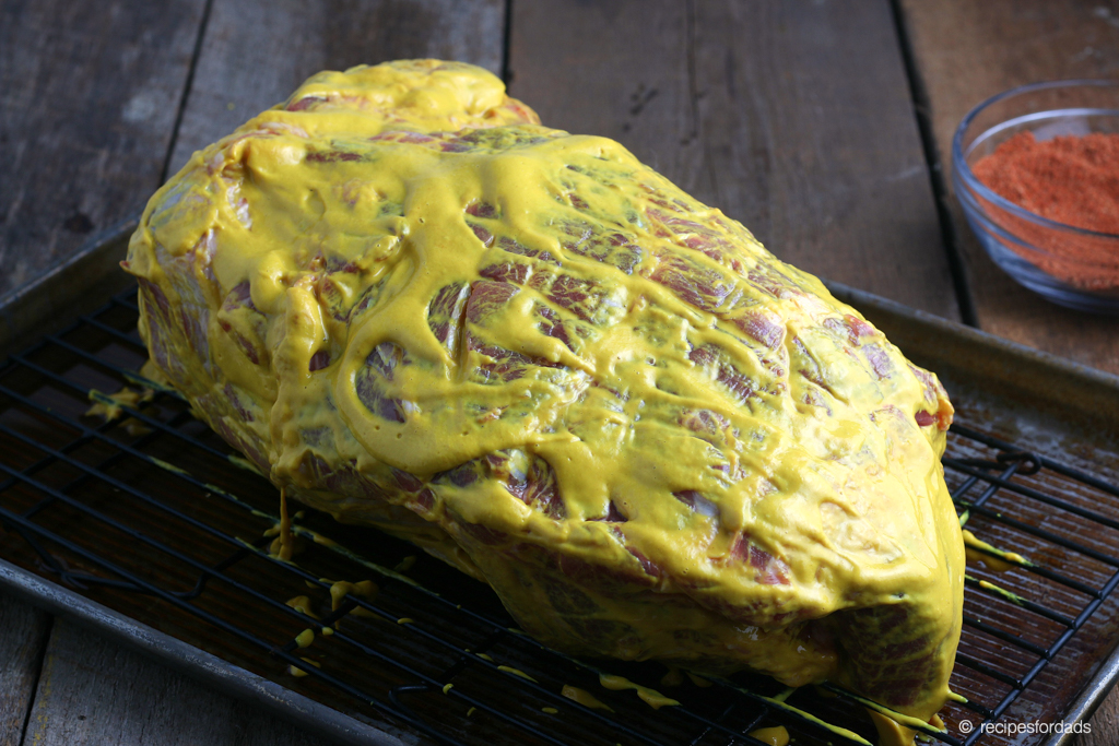 Pork butt covered in Mustard