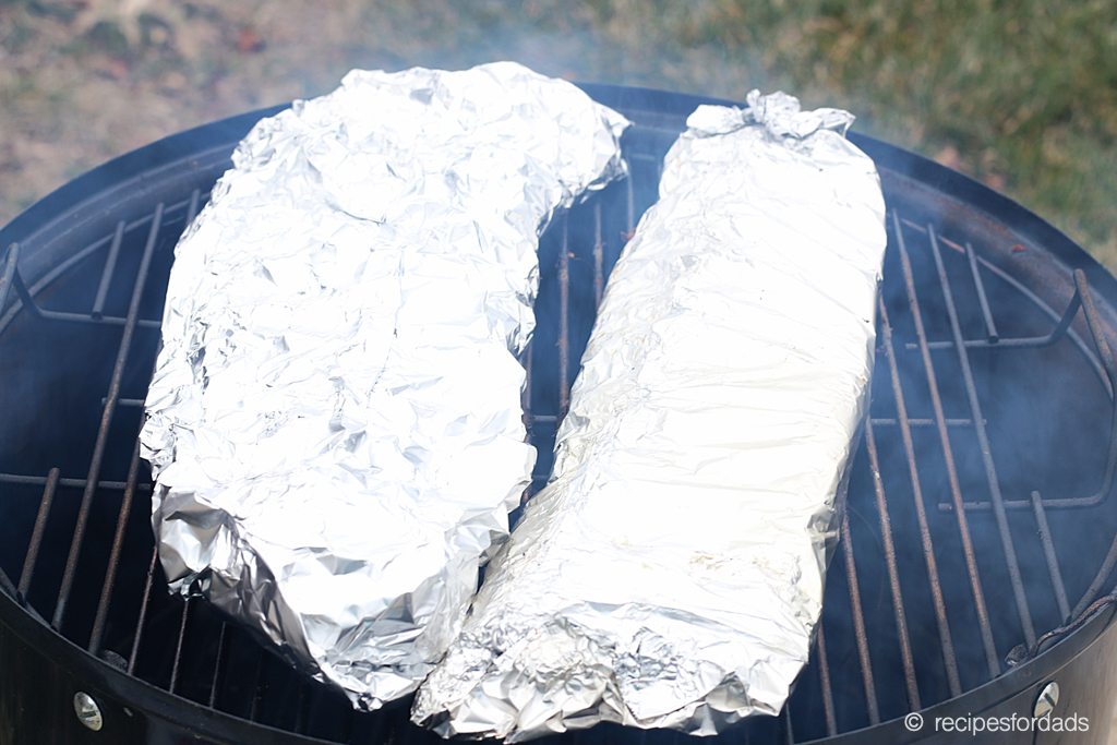 Wrapping ribs in foil and placed back on smoker