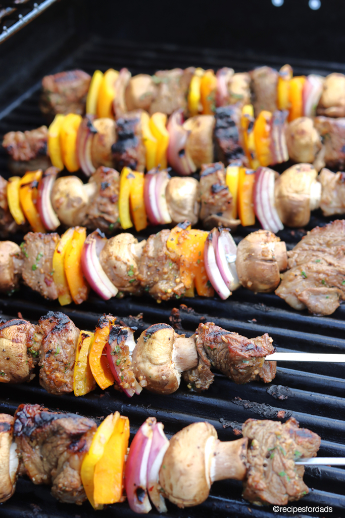 beef and veggie kabobs on the grill