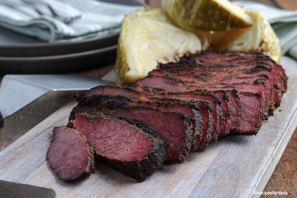 smoked corn beef and cabbage served on cutting board