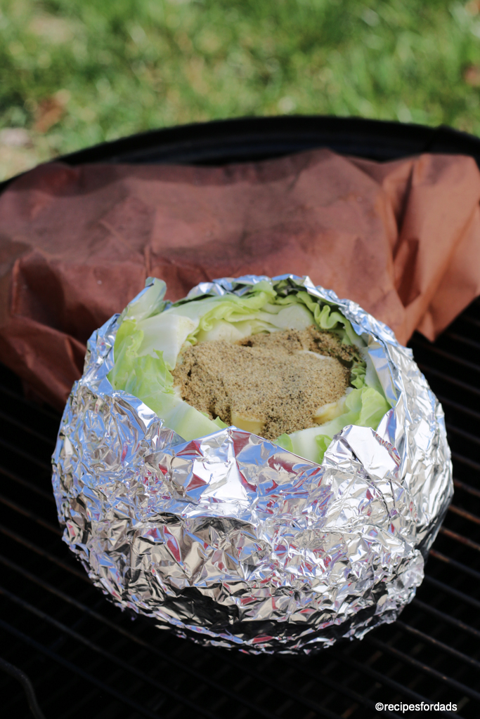 cabbage wrapped in foil, on smoker