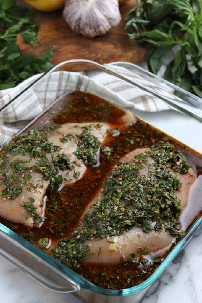 Chicken breasts seasoned with oils, oregano and parsley. 