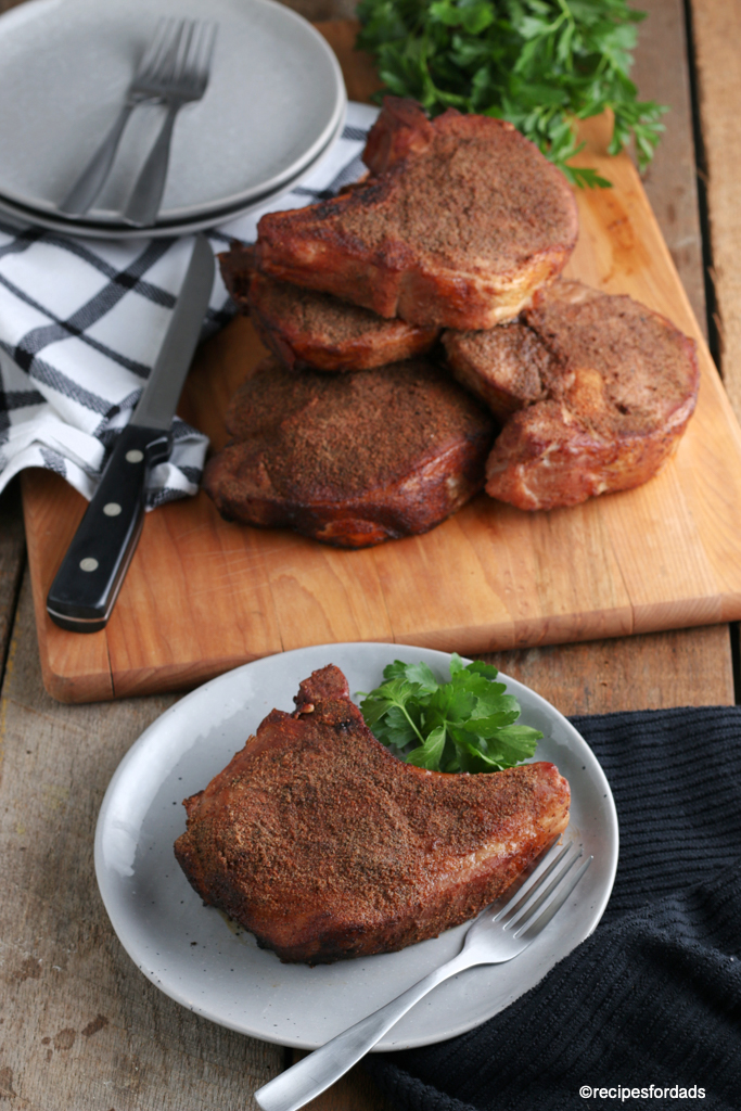 Smoked Pork chop on white dish