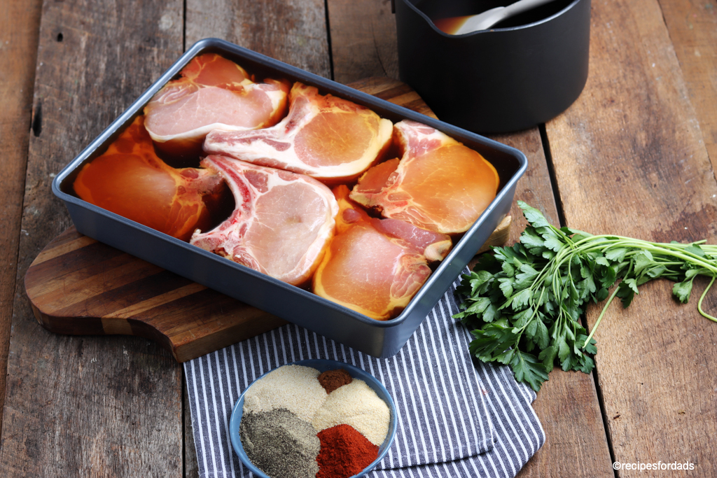 pork chops marinating in brine