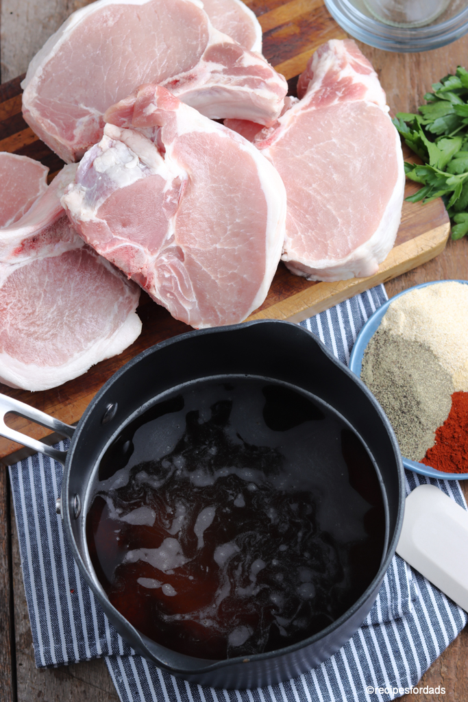 pork chop marinade next to raw pork chops