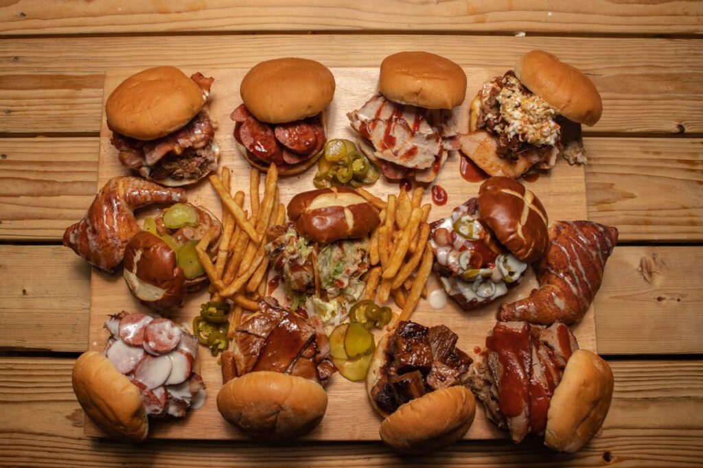 11 different BBQ sandwiches served with fries at Slap's BBQ restaurant in Kansas City