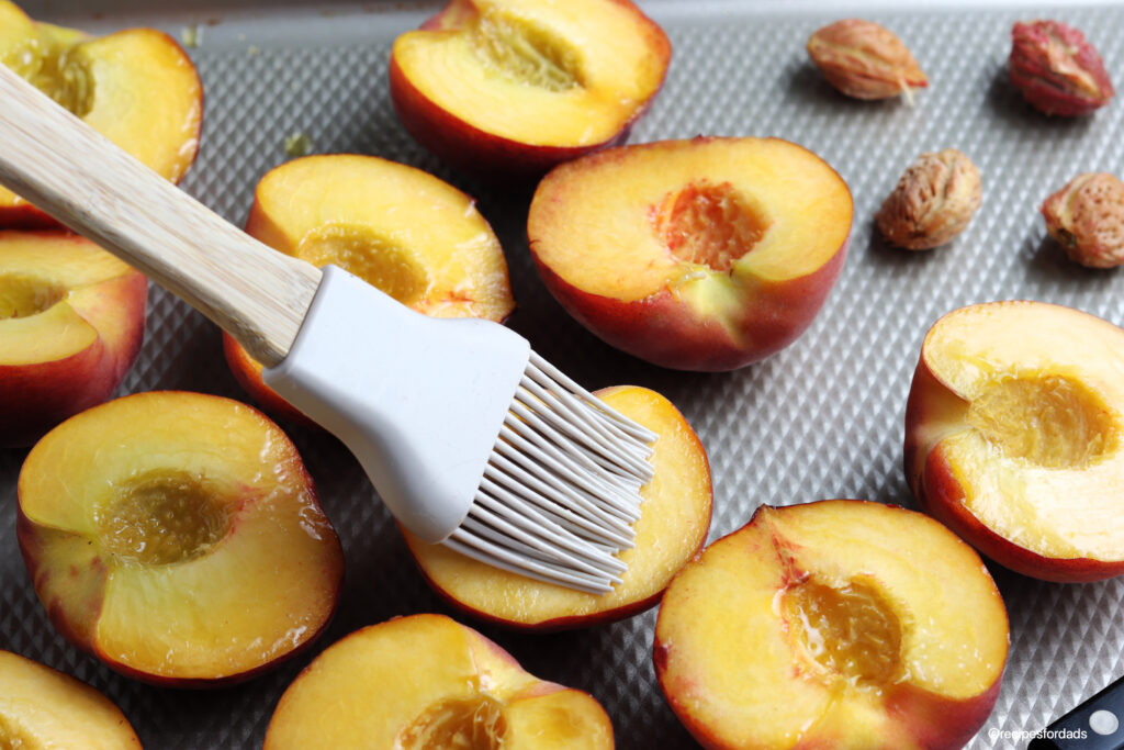 brushing glaze on the peaches