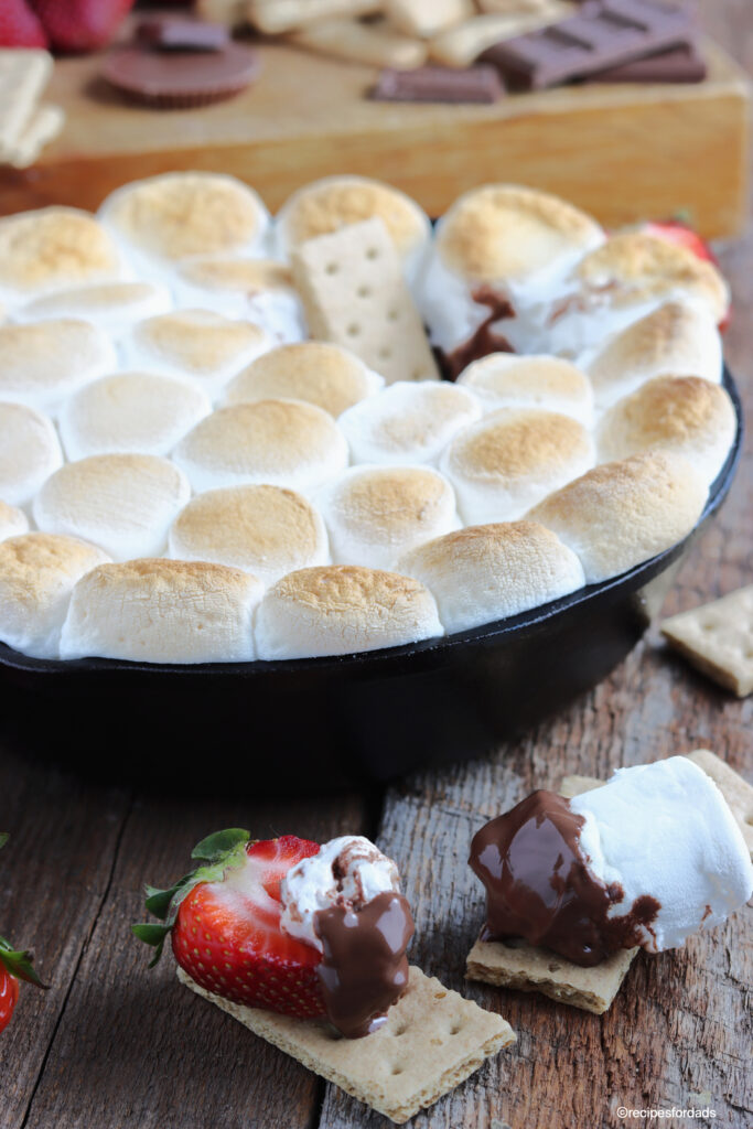 S'mores Dip with graham crackers and strawberries