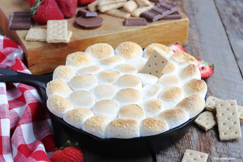 S'mores Dip served in the iron skillet and graham crackers