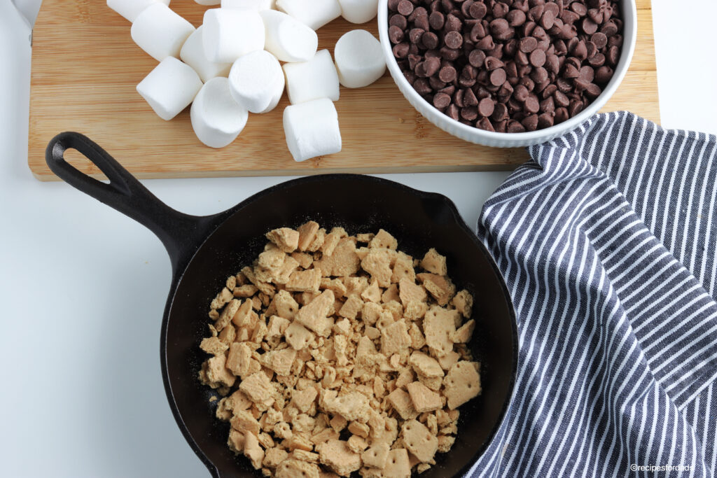 crushed graham crackers in an iron skillet