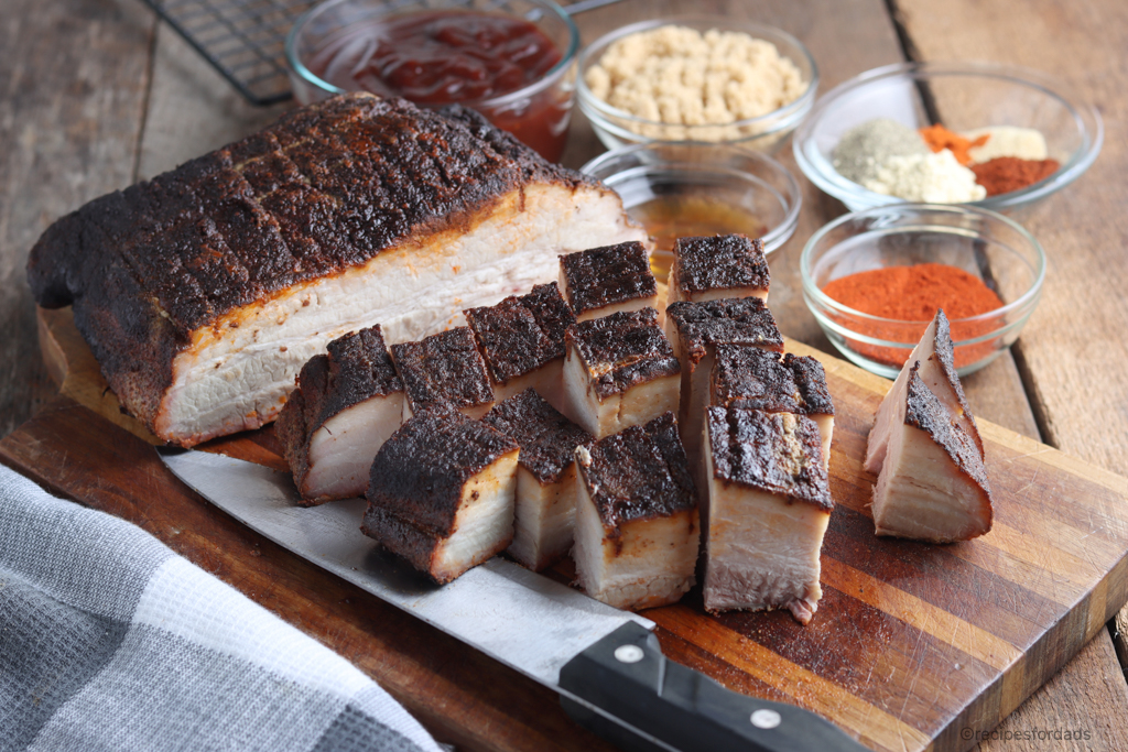 Sliced/cut Pork Belly with ingredients to make burnt ends