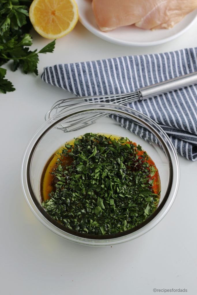 Oregano, Basil and Parsley mixed with other ingredients to make this chicken marinade