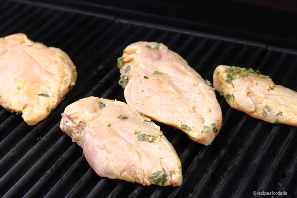 Raw chicken on the grill