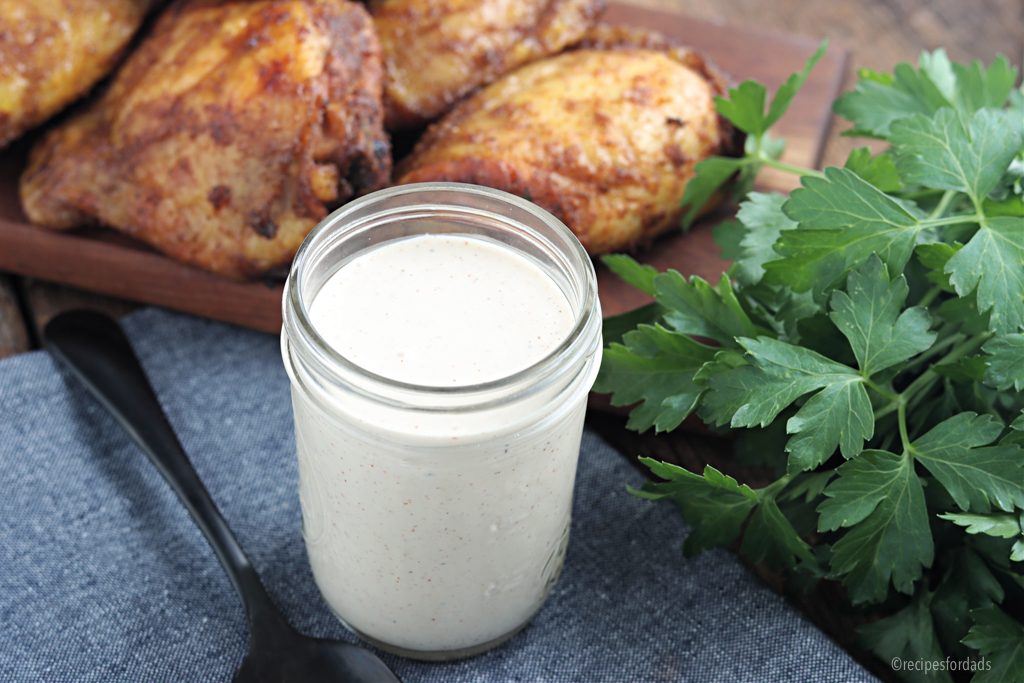 Alabama White Sauce served with chicken thighs