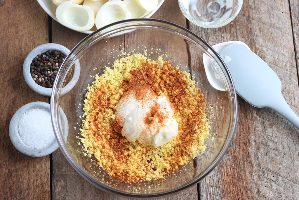 Adding ingredients to egg yolks