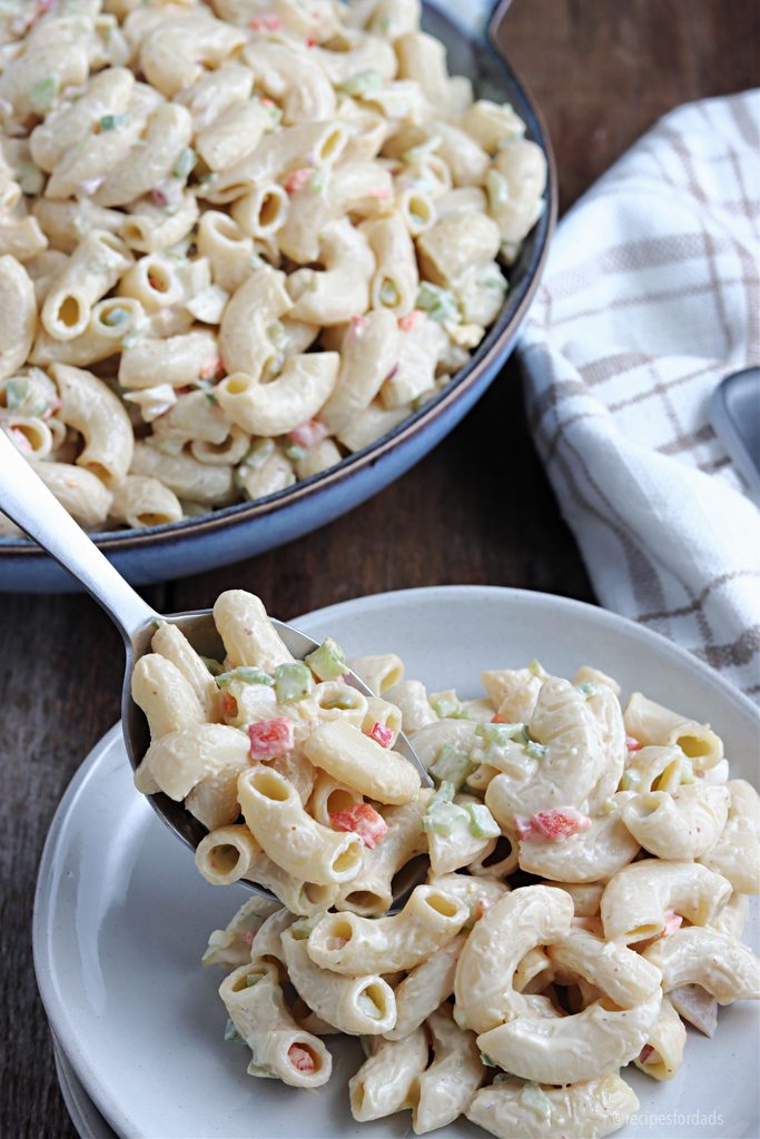 serve macaroni salad in white bowl and spoon