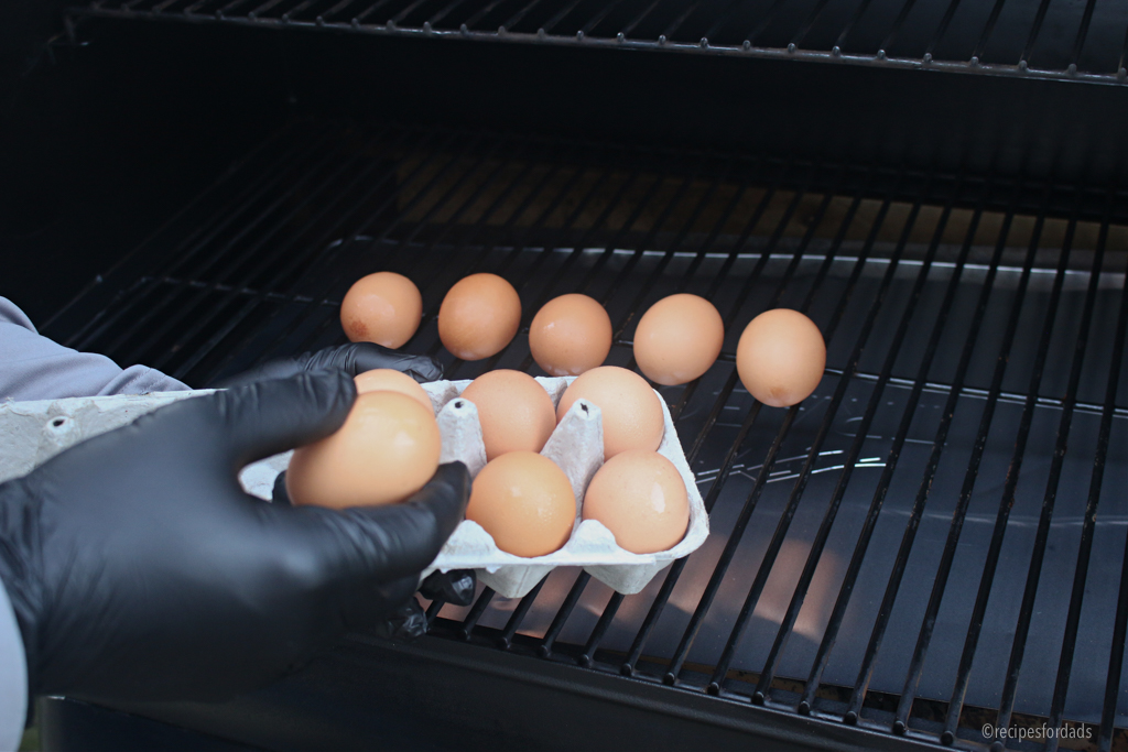 Putting eggs in smoker