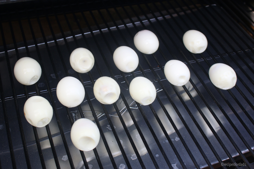 Peeled eggs on smoker.