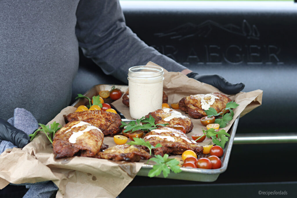 Smoked Chicken Thighs on Platter served with white bbq sauce