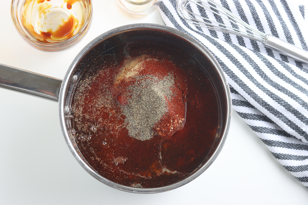 mixing ingredients in saucepan for Kansas City BBQ Sauce