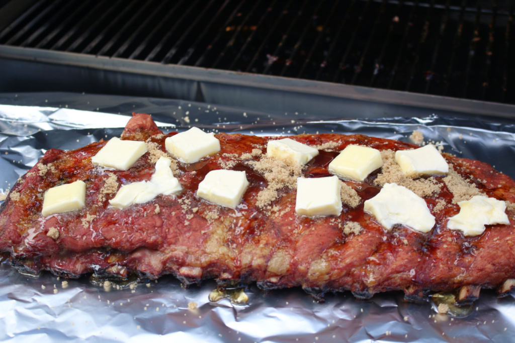 butter and brown sugar on pork ribs