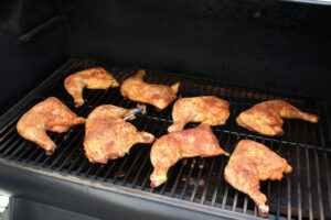 smoked chicken quarters on a Traeger Smoker