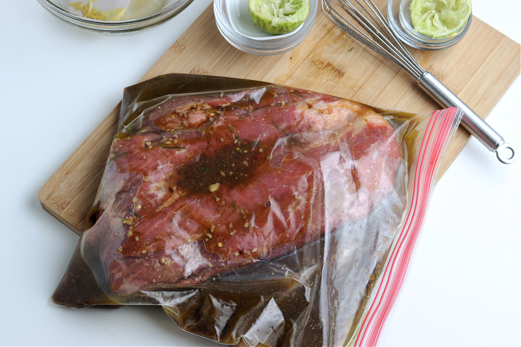 flank steak in resealable bag with marinade